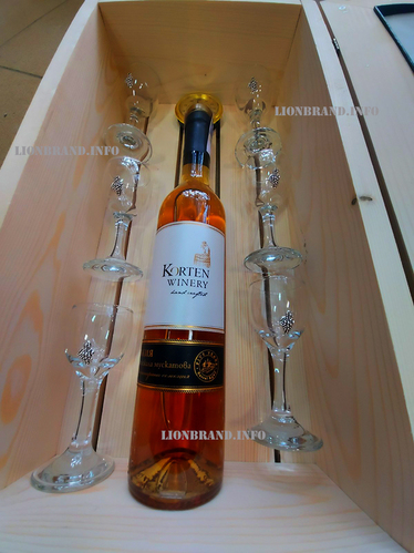 Korten brandy set with glasses on a chair and metal bunches